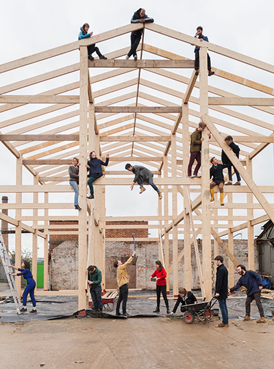 Assemble barn raising Image: Assemble